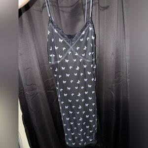 little black sleeveless butterfly dress